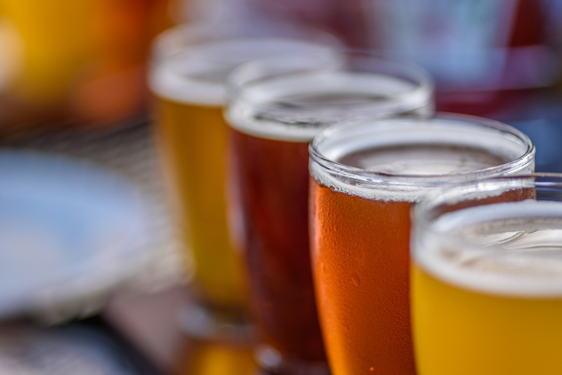 Beer flight at outdoor beer garden in summertime